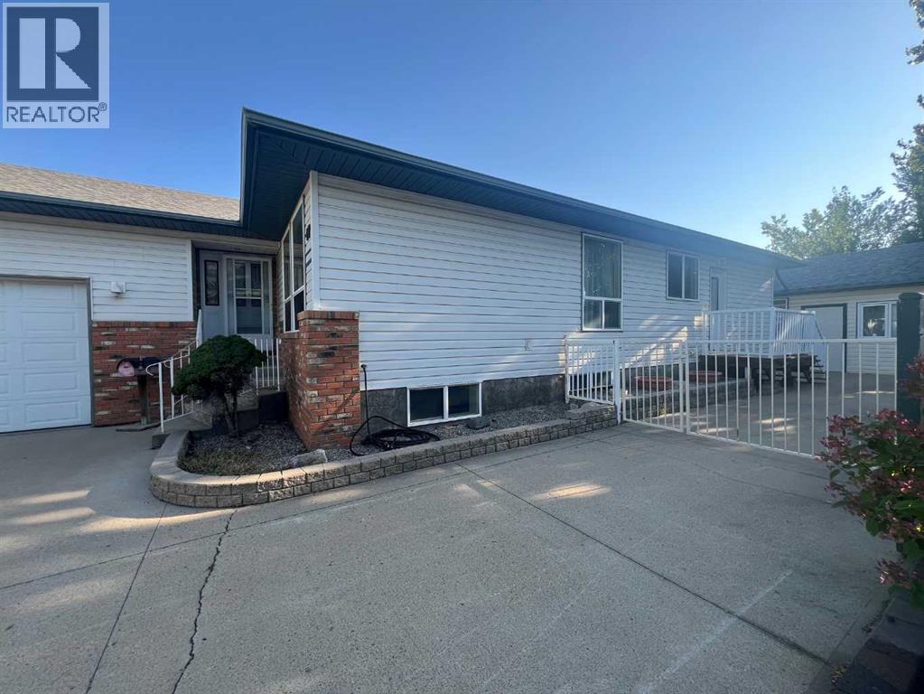 47 Squamish Boulevard W, Lethbridge, Alberta  T1K 7J7 - Photo 3 - A2252400