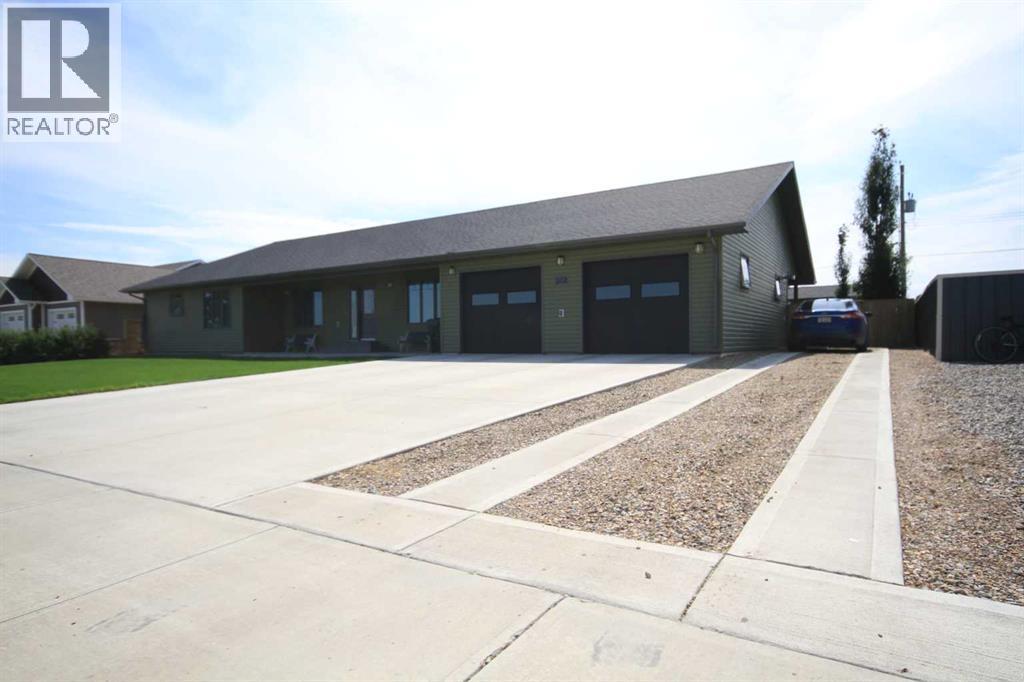 212 3 Street N, Grassy Lake, Alberta  T0K 0Z0 - Photo 3 - A2245248