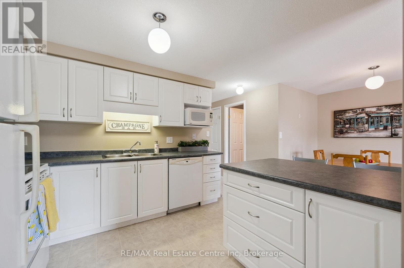 179 Prosperity Drive, Kitchener, Ontario N2E 4E5 - Photo 4 - X12371959