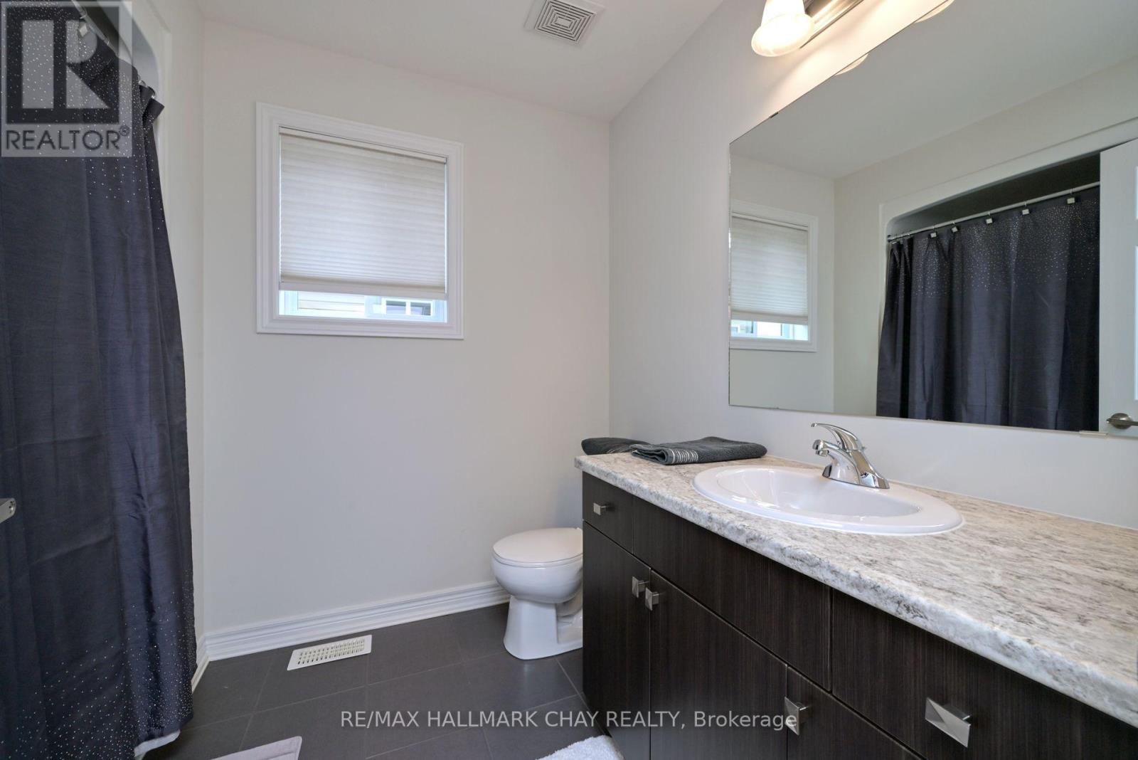 32 Burt Avenue, New Tecumseth, Ontario  L9R 0G8 - Photo 20 - N12372044