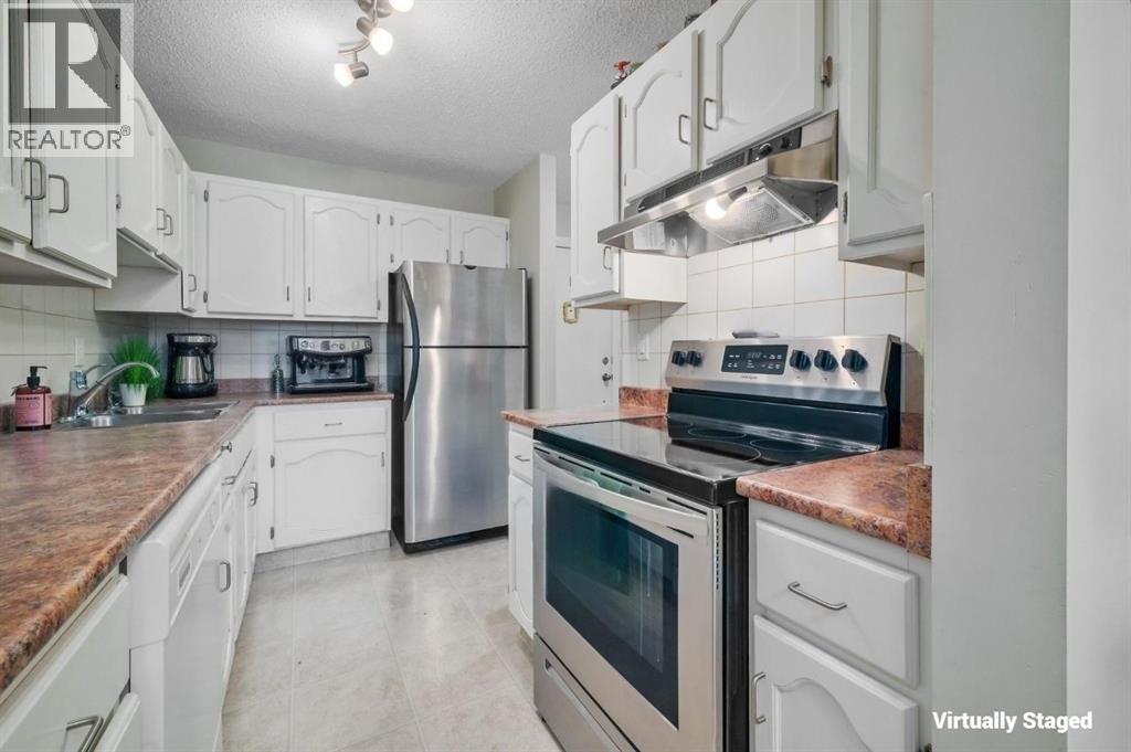 Property at 102, 611 67 Avenue SW image 2