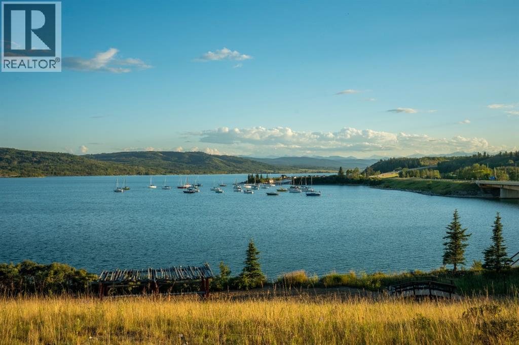 407 Cottage Club Grove, Rural Rocky View County, Alberta  T4C 1B1 - Photo 16 - A2245242