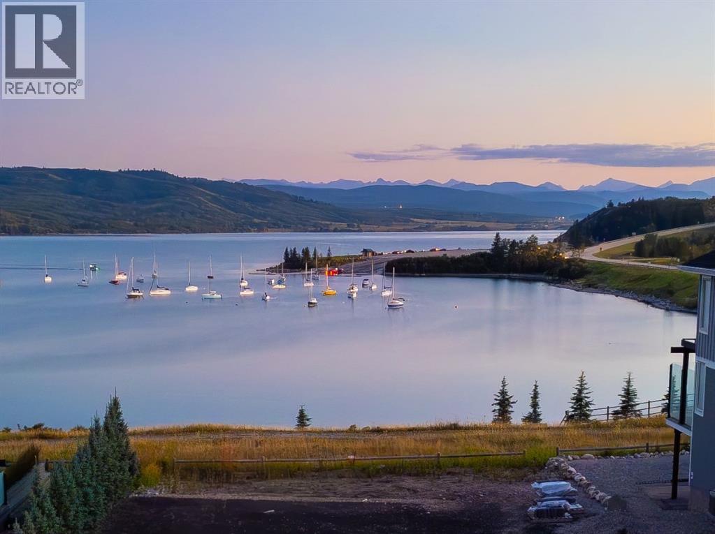 407 Cottage Club Grove, Rural Rocky View County, Alberta  T4C 1B1 - Photo 19 - A2245242