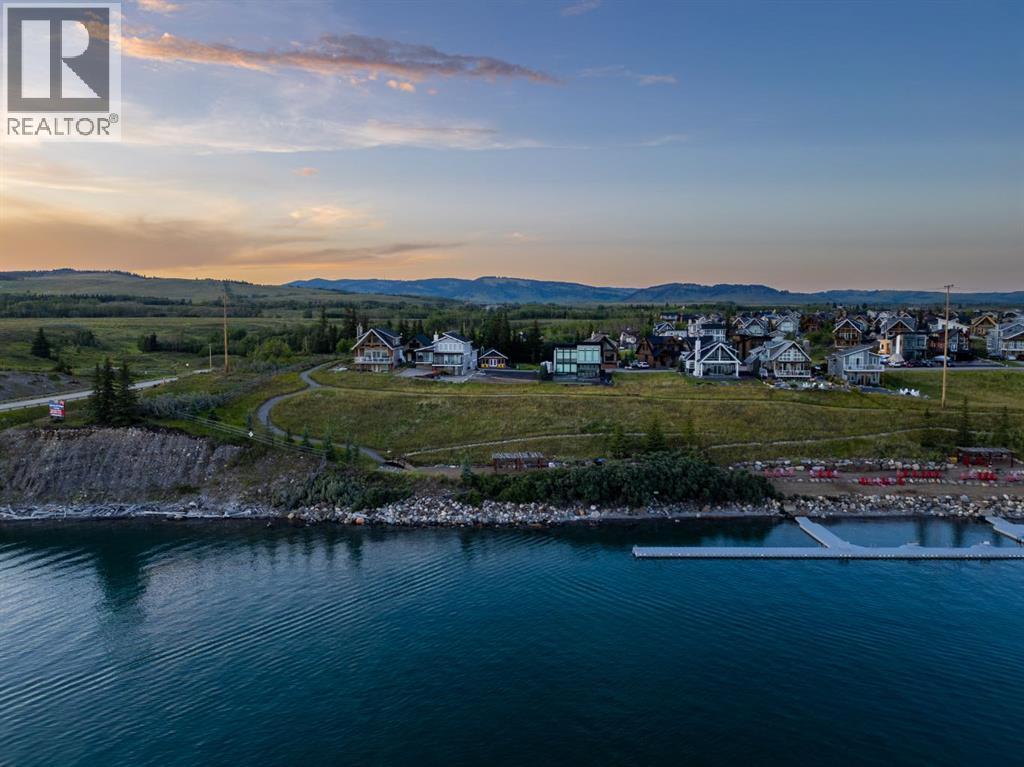 407 Cottage Club Grove, Rural Rocky View County, Alberta  T4C 1B1 - Photo 9 - A2245242
