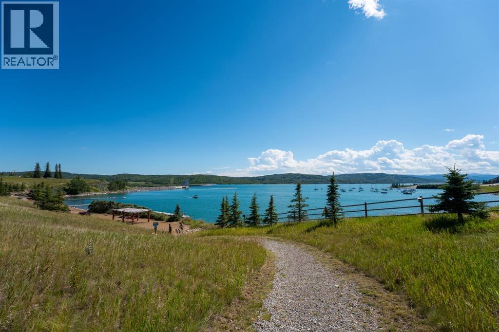 407 Cottage Club Grove, Rural Rocky View County, Alberta  T4C 1B1 - Photo 14 - A2245242