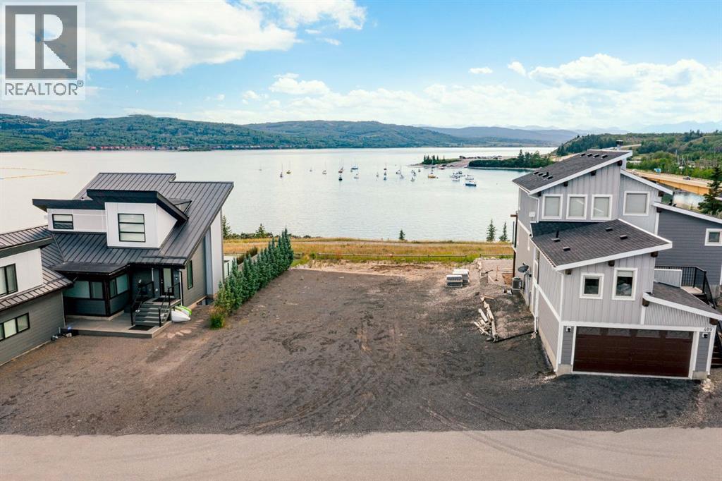 407 Cottage Club Grove, Rural Rocky View County, Alberta  T4C 1B1 - Photo 36 - A2245242