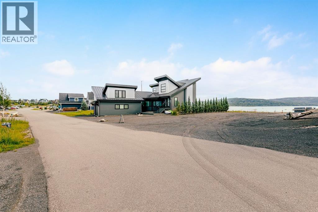 407 Cottage Club Grove, Rural Rocky View County, Alberta  T4C 1B1 - Photo 37 - A2245242