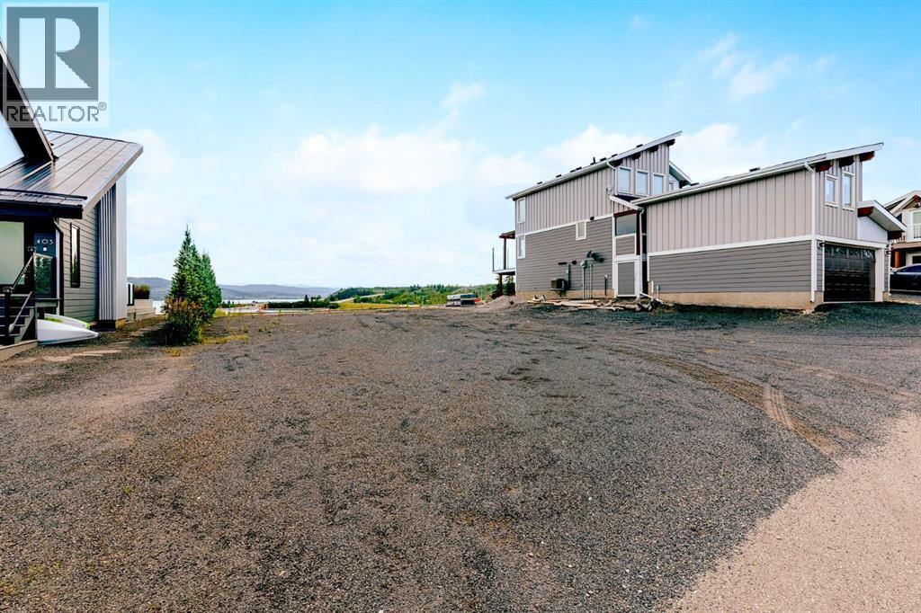 407 Cottage Club Grove, Rural Rocky View County, Alberta  T4C 1B1 - Photo 38 - A2245242