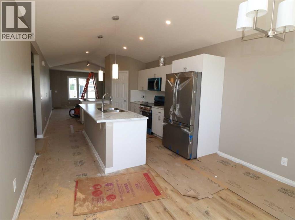 443 Henricks Drive, Irricana, Alberta  T0M 1G0 - Photo 9 - A2251345