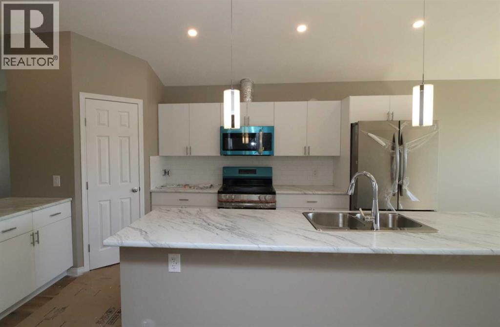 443 Henricks Drive, Irricana, Alberta  T0M 1G0 - Photo 7 - A2251345