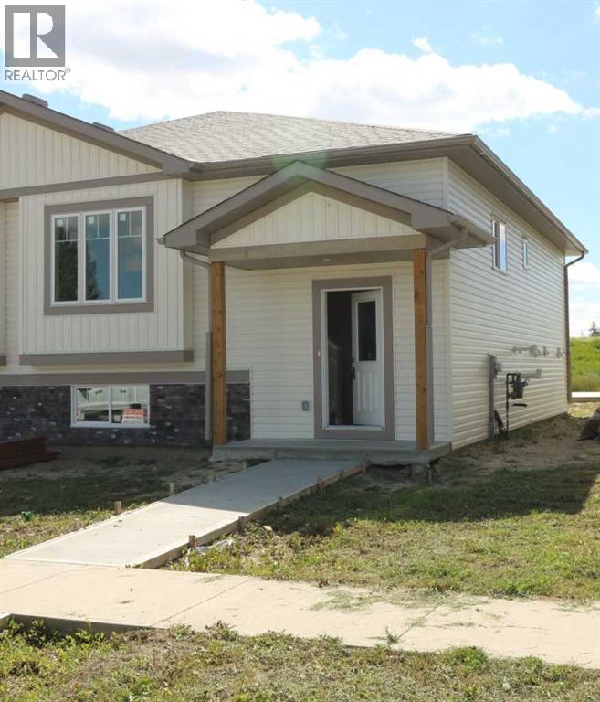443 Henricks Drive, Irricana, Alberta  T0M 1G0 - Photo 2 - A2251345