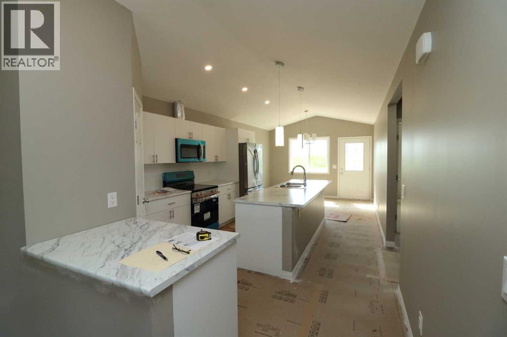443 Henricks Drive, Irricana, Alberta  T0M 1G0 - Photo 6 - A2251345