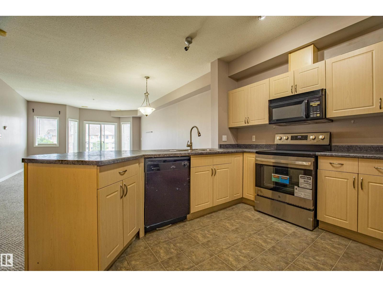 #326 4304 139 Av Nw, Edmonton, Alberta  T5Y 0H6 - Photo 3 - E4455549