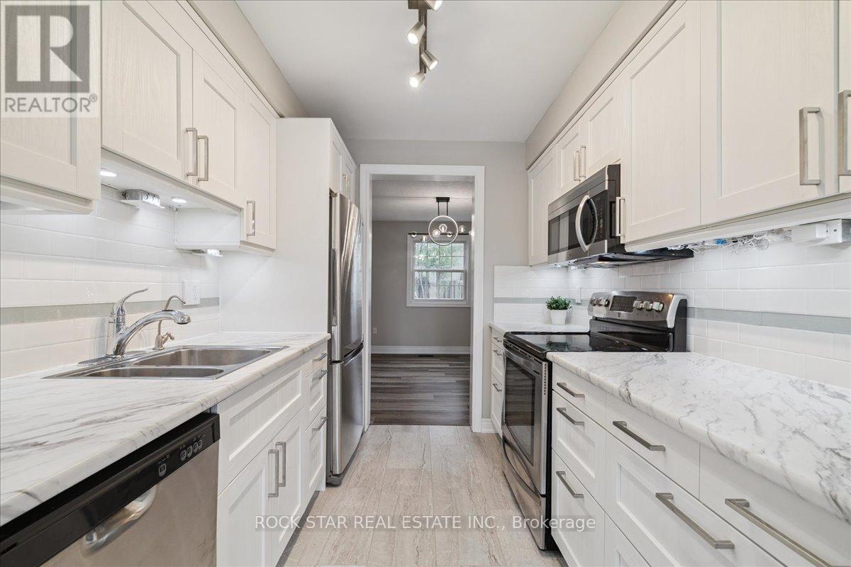 61 Adis Avenue, Hamilton (Gurnett), Ontario  L9C 6T9 - Photo 11 - X12373087