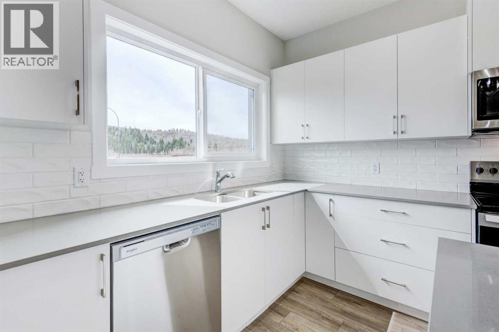 166 Creekview Gardens Sw, Calgary, Alberta  T2X 5X8 - Photo 11 - A2215819