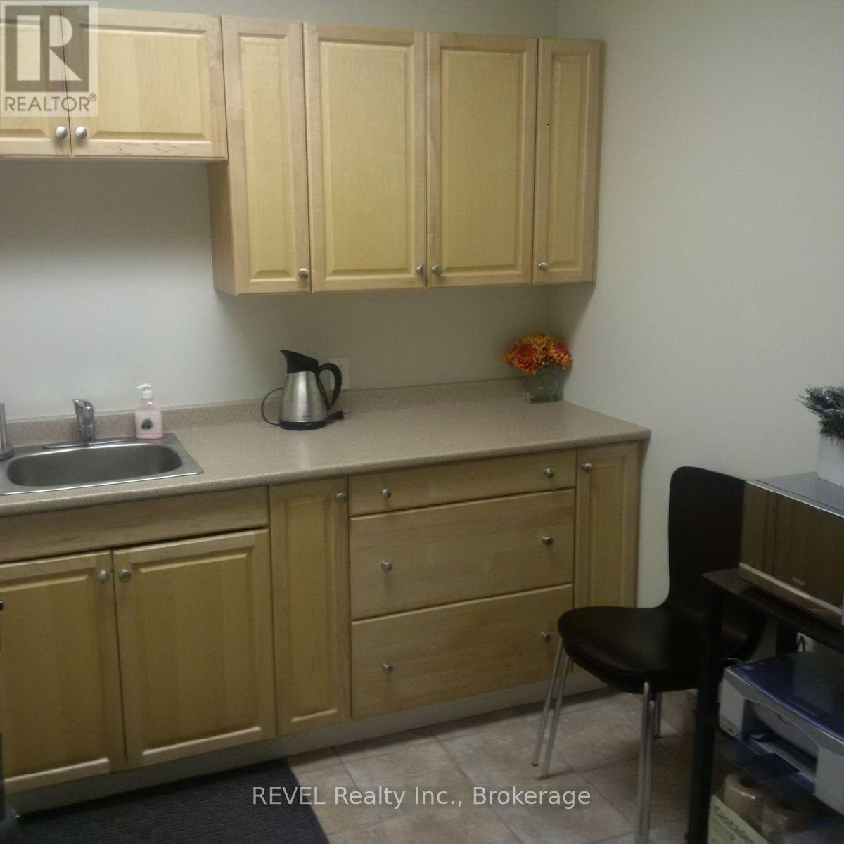 103a - 73 Ontario Street, St. Catharines, Ontario  L2R 5J5 - Photo 4 - X12373497