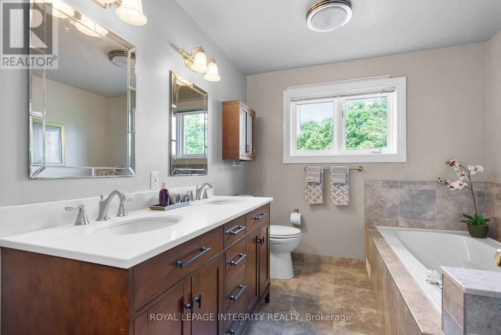22 Marchbrook Circle, Ottawa, Ontario  K2W 1A1 - Photo 32 - X12374046