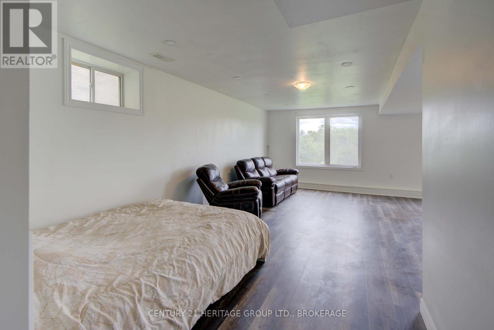104 Brennan Crescent, Loyalist, Ontario  K0H 2H0 - Photo 36 - X12374890