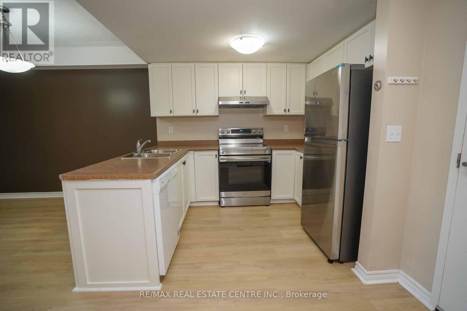 106 - 39 Goodwin Drive, Guelph, Ontario  N1L 0E5 - Photo 6 - X12374867