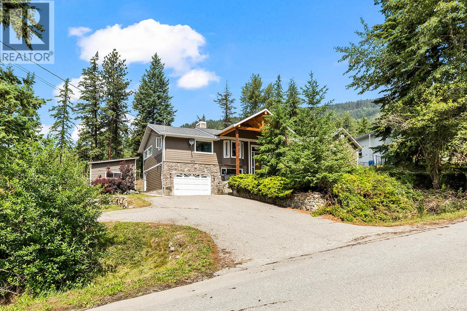 7992 Falcon Ridge Crescent, Kelowna, British Columbia  V1P 1J2 - Photo 2 - 10357515
