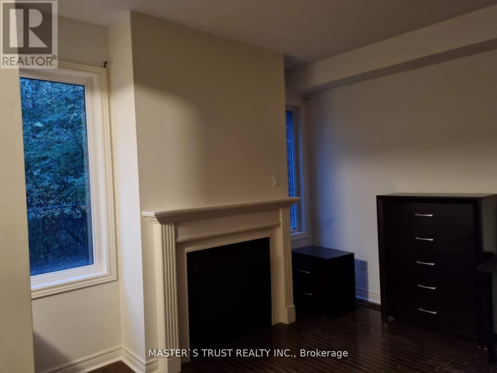 15 Isaac Devins Boulevard, Toronto, Ontario  M9M 0C7 - Photo 3 - W12375651