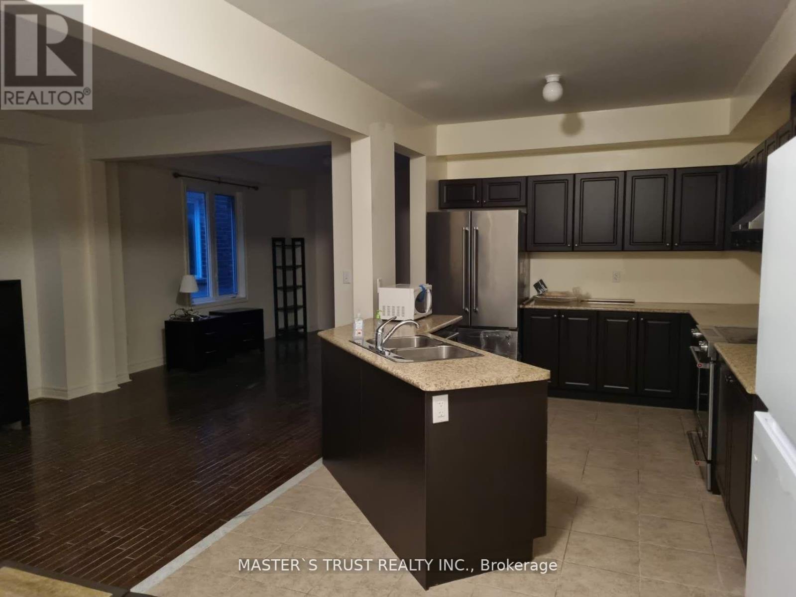 15 Isaac Devins Boulevard, Toronto, Ontario  M9M 0C7 - Photo 4 - W12375651