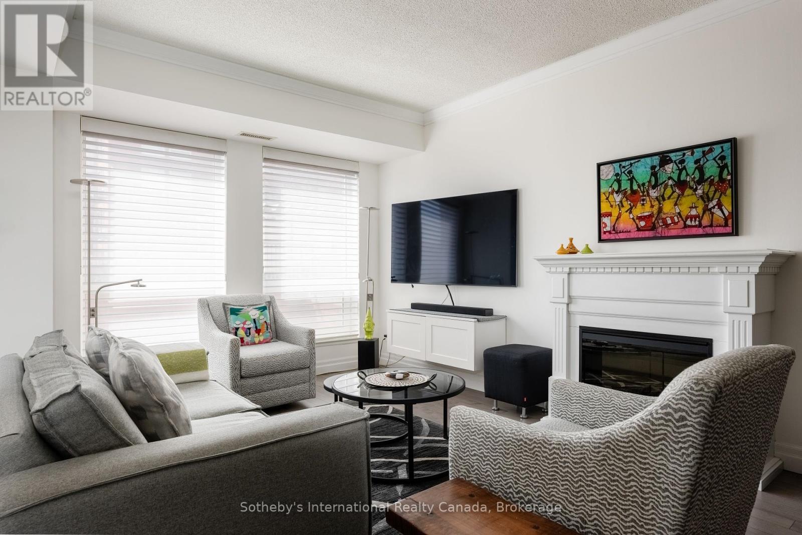 105 - 50 Old Mill Road, Oakville, Ontario  L6J 7W1 - Photo 2 - W12055672