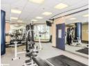 Workout area with a paneled ceiling