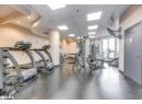 Workout area featuring a paneled ceiling