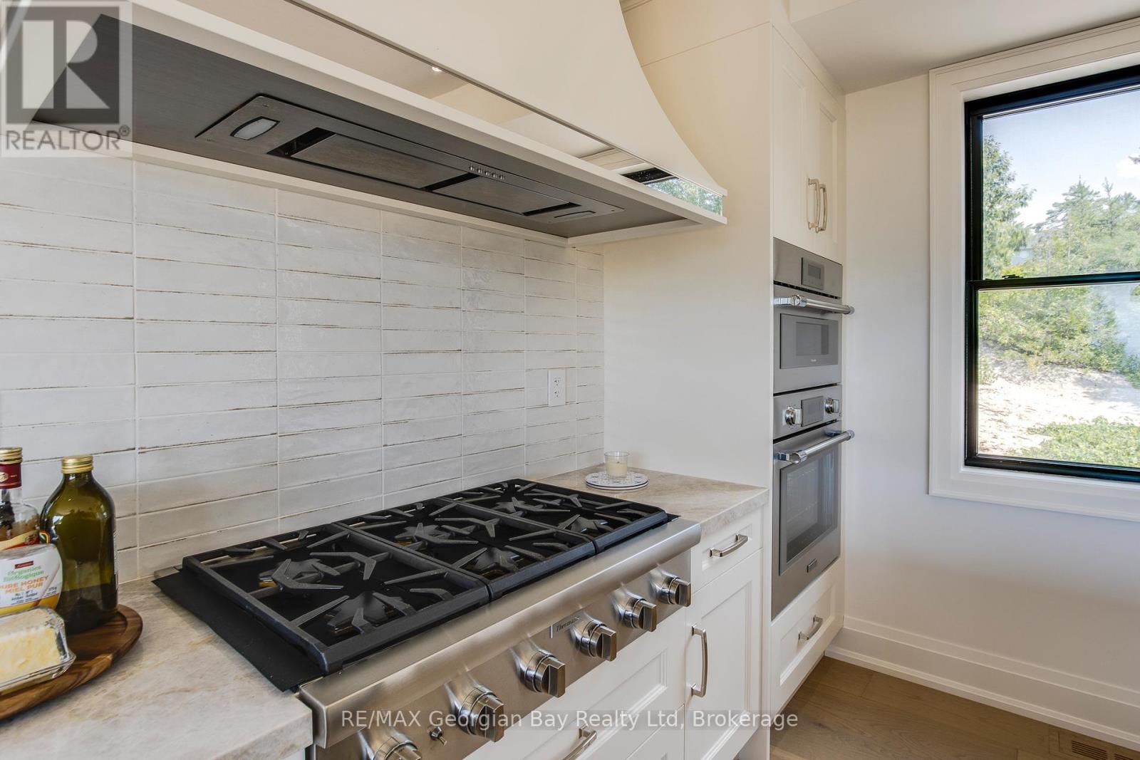 23 Trew Avenue, Tiny, Ontario  L0L 2T0 - Photo 18 - S12365383