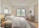 Bedroom featuring wood finished floors