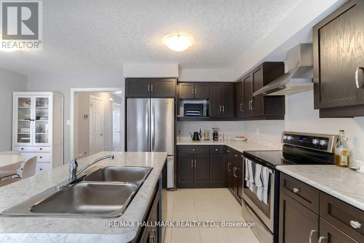 75 John Brabson Crescent, Guelph, Ontario  N1G 0G7 - Photo 7 - X12377205