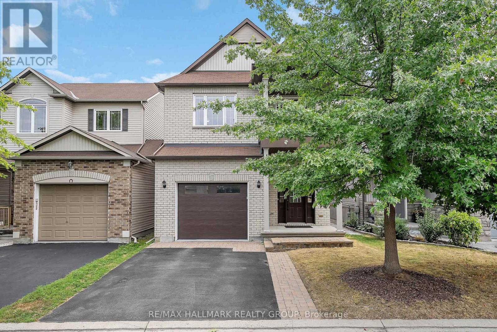 218 Harthill Way, Ottawa, Ontario  K2J 0P2 - Photo 2 - X12377480