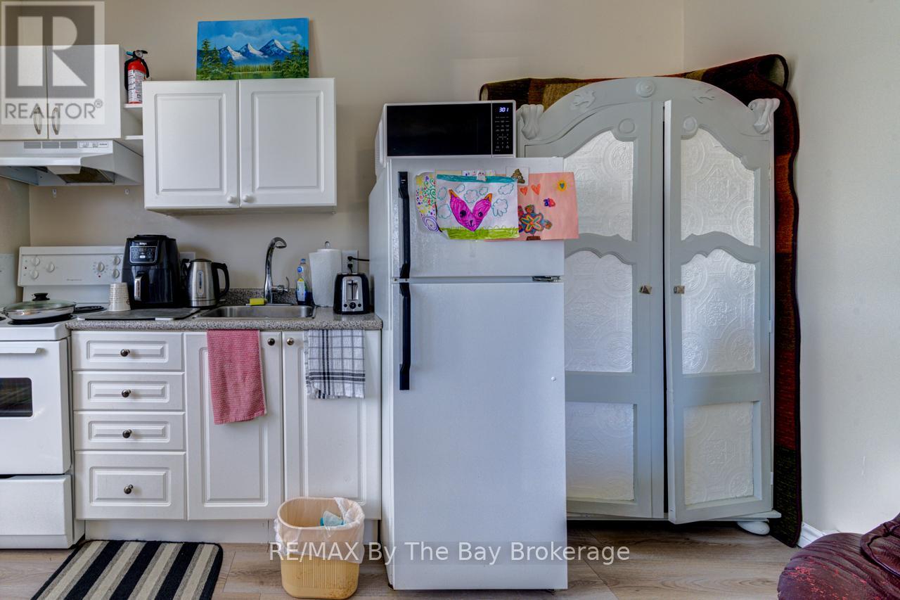 8 Yonge Street N, Springwater, Ontario  L0L 1P0 - Photo 7 - S12377965