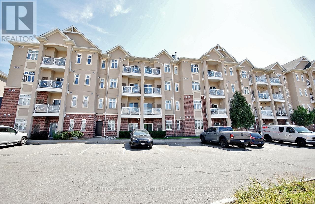 411 - 1360 Costigan Road, Milton (Cl Clarke), Ontario  L9T 8X6 - Photo 1 - W12377808