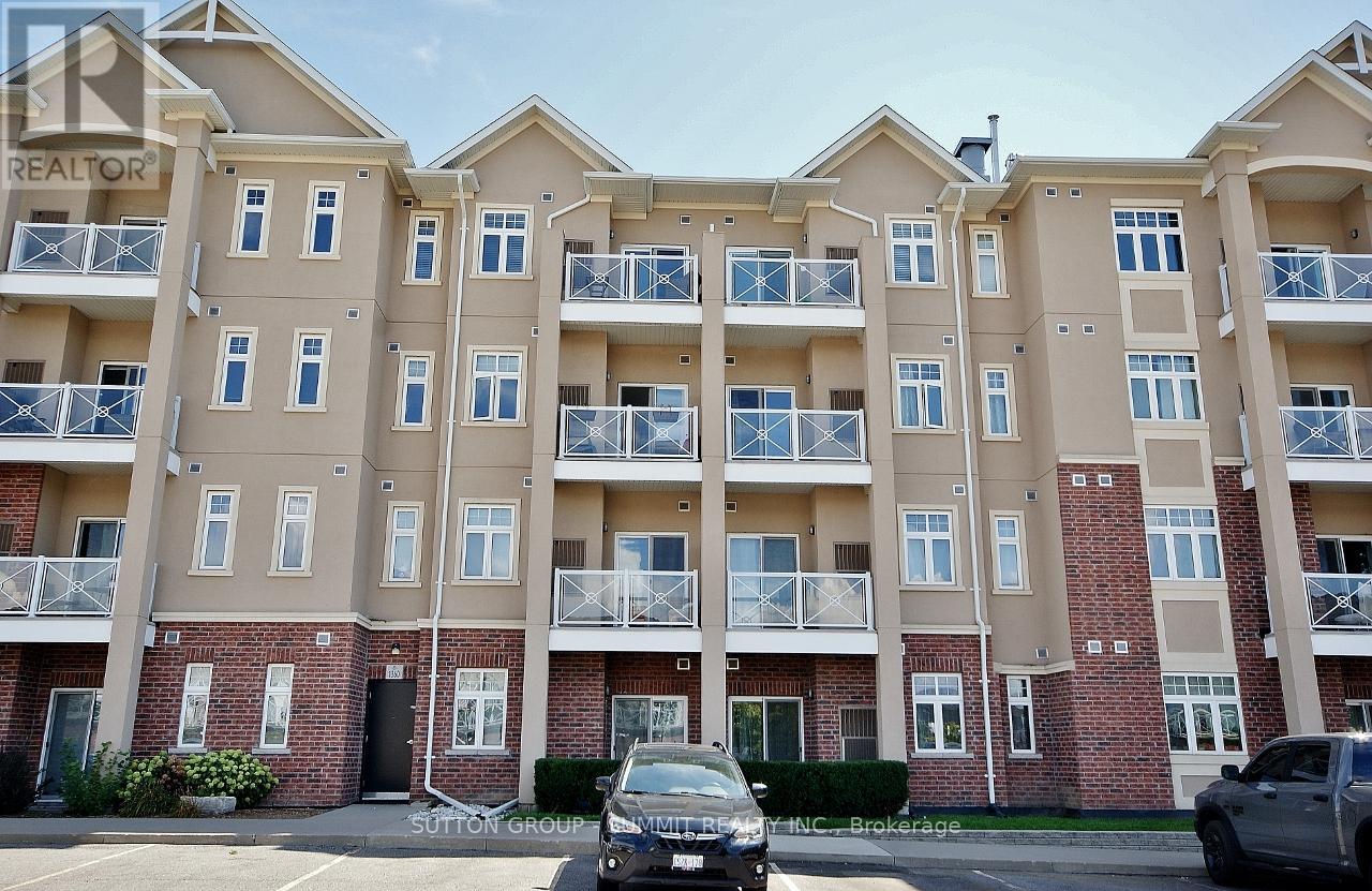 411 - 1360 Costigan Road, Milton (Cl Clarke), Ontario  L9T 8X6 - Photo 2 - W12377808