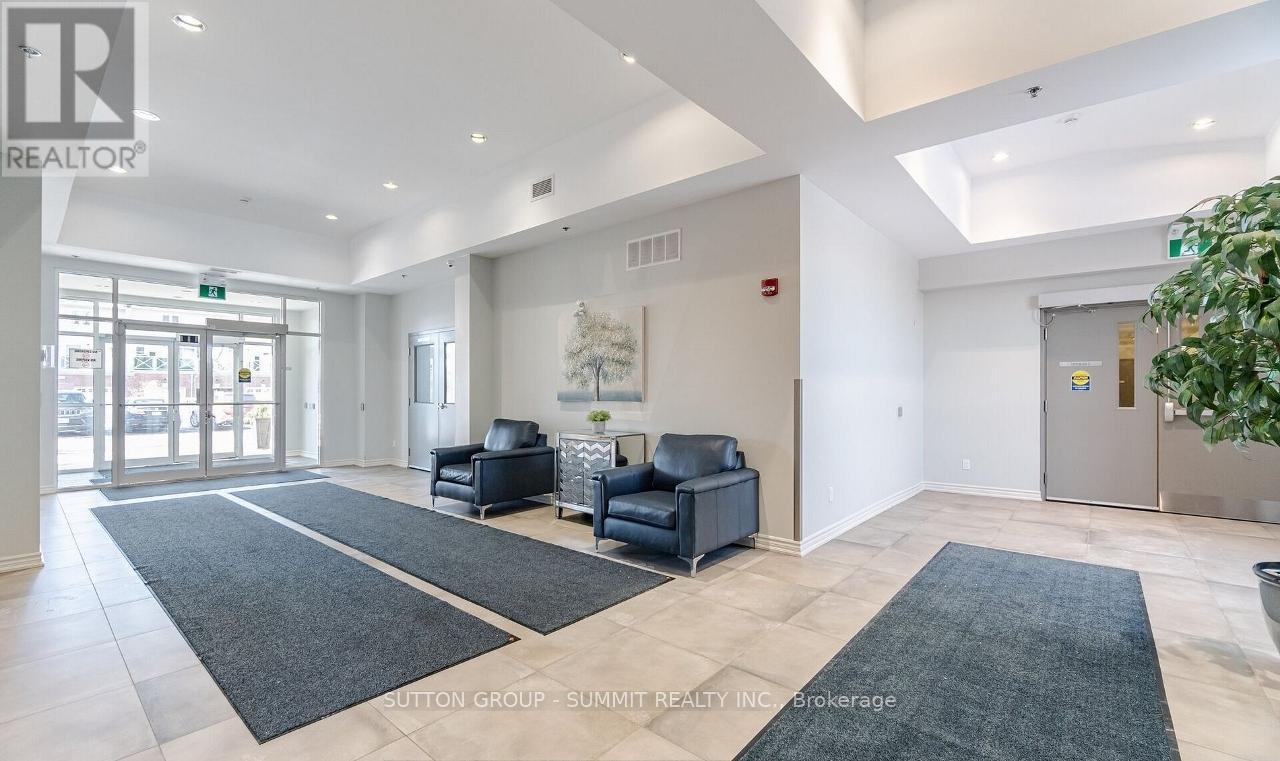 411 - 1360 Costigan Road, Milton (Cl Clarke), Ontario  L9T 8X6 - Photo 4 - W12377808