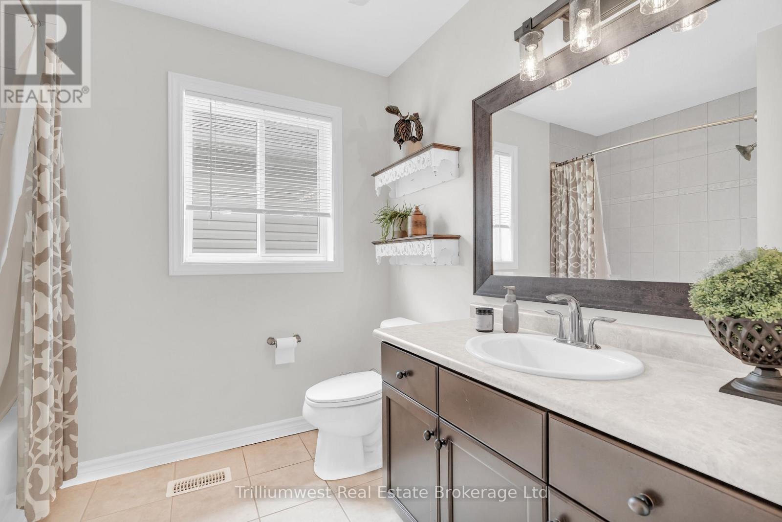 210 Couling Crescent, Guelph, Ontario  N1E 0L4 - Photo 18 - X12378089