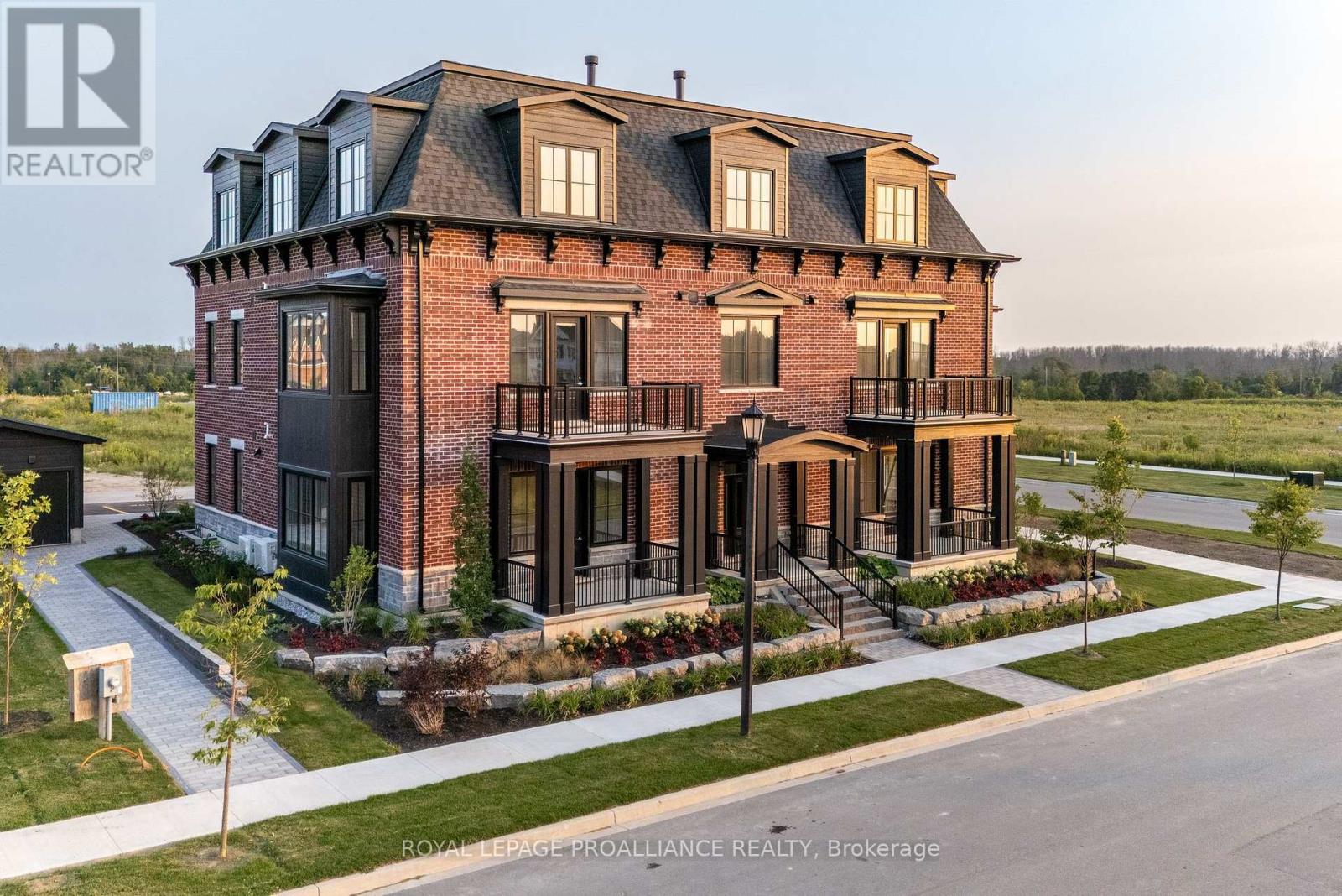 302 - 941 Charles Wilson Parkway, Cobourg, Ontario  K9A 0L2 - Photo 1 - X12378396