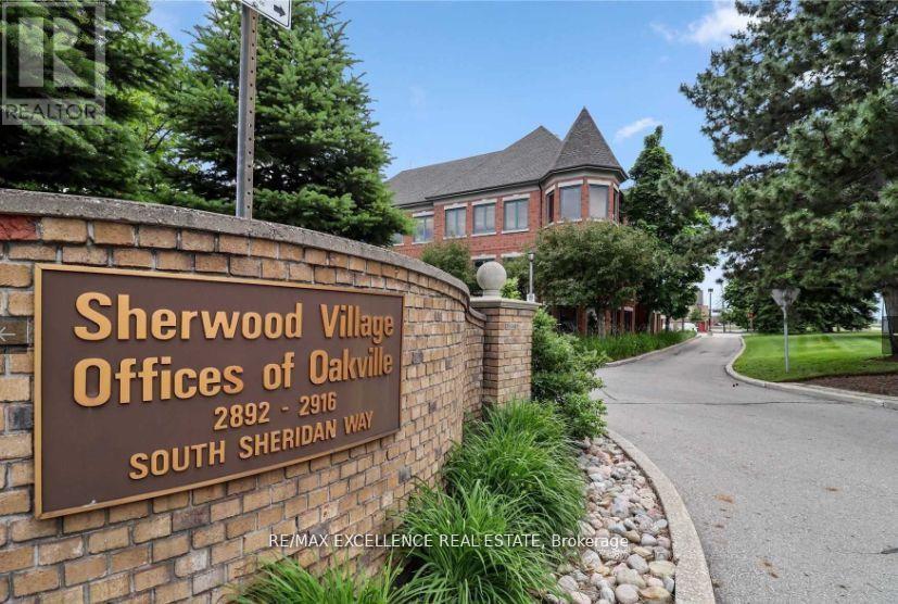 300 - 2896 South Sheridan Way, Oakville, Ontario  L6J 7L4 - Photo 3 - W12378945