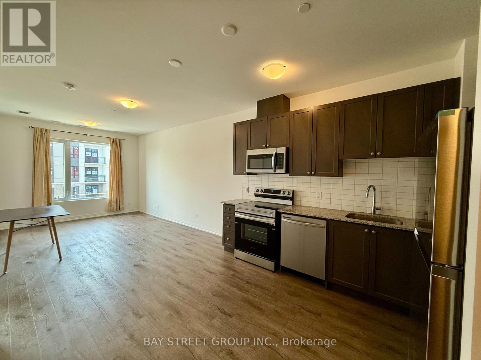 309 - 3265 Carding Mill Trail, Oakville, Ontario  L6M 0W6 - Photo 4 - W12379170