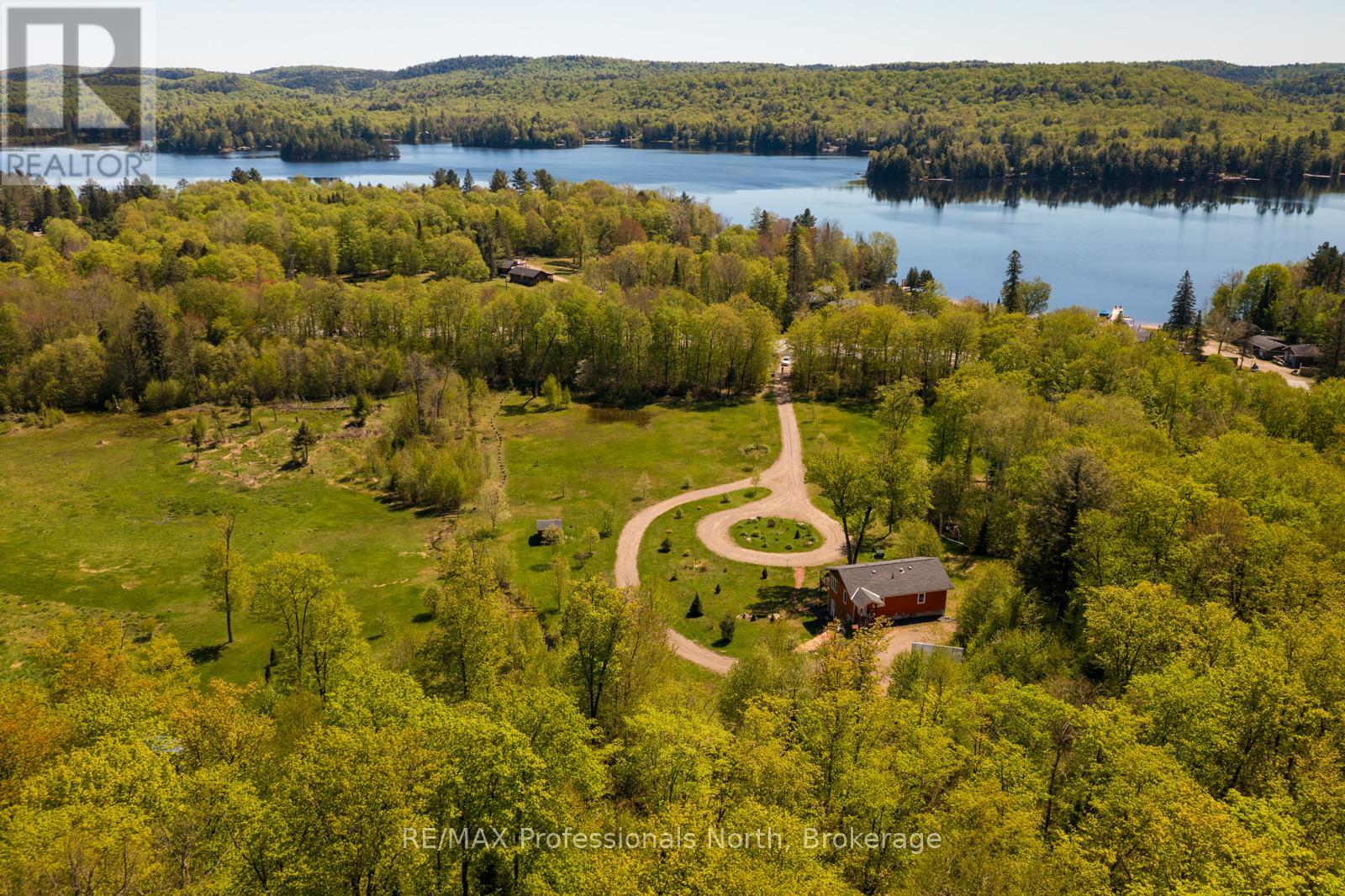 4043 Highway 60, Algonquin Highlands, Ontario  P0A 1H0 - Photo 2 - X12379349