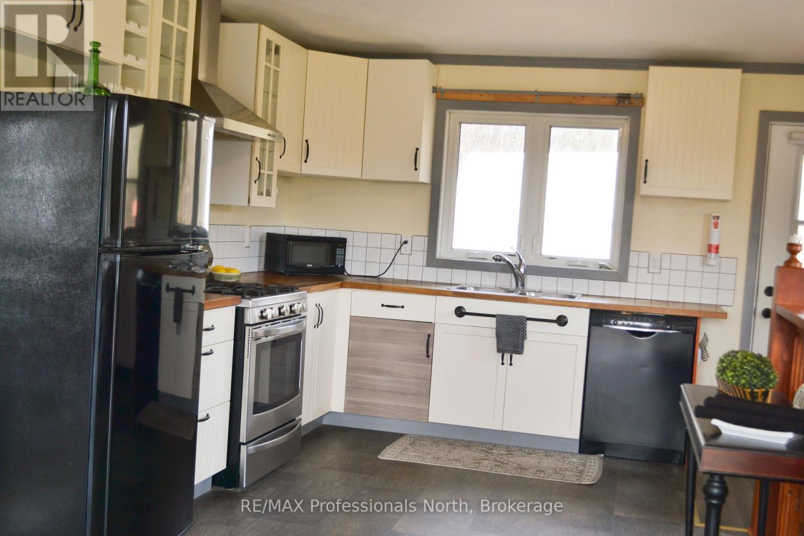 4043 Highway 60, Algonquin Highlands, Ontario  P0A 1H0 - Photo 6 - X12379349
