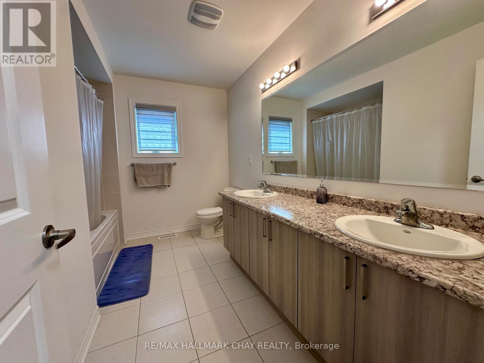4 Wakefield Boulevard, Essa, Ontario  L0M 1B5 - Photo 15 - N12379606