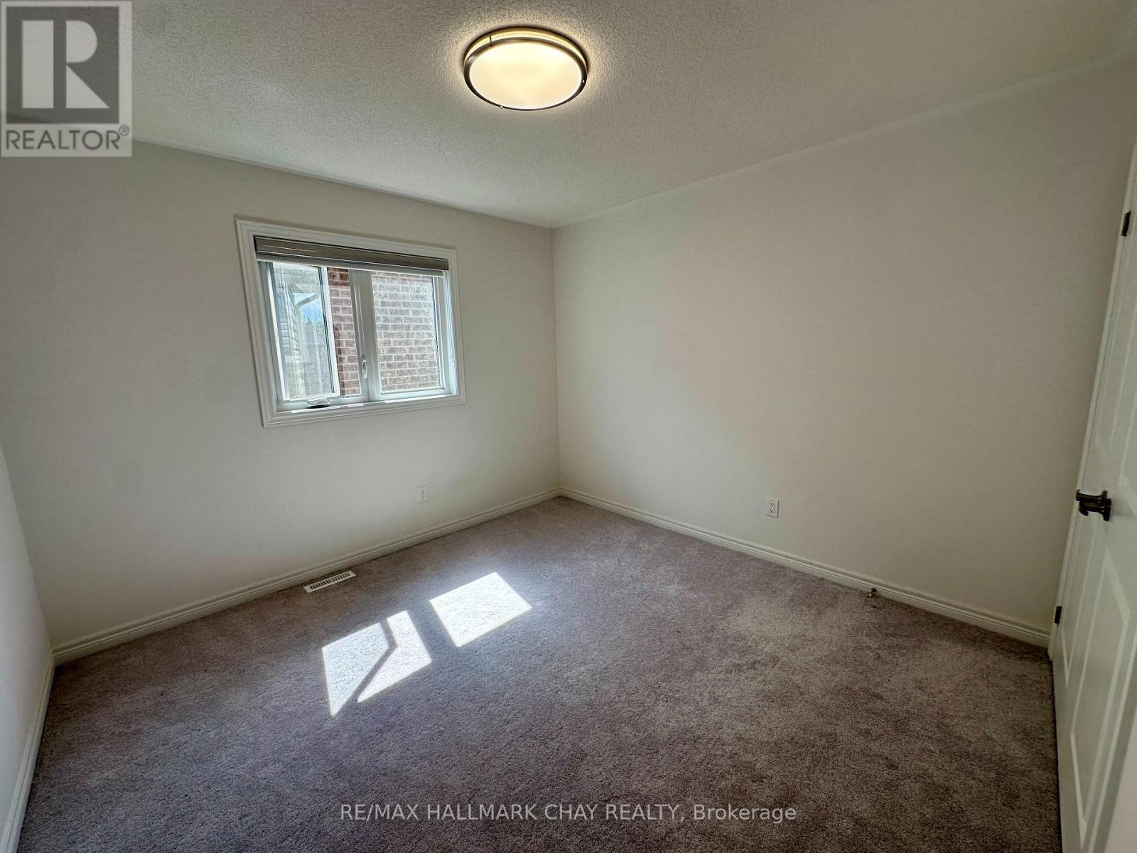 4 Wakefield Boulevard, Essa, Ontario  L0M 1B5 - Photo 18 - N12379606
