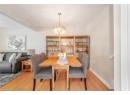 Dining room featuring a chandelier and light wood finished floors
