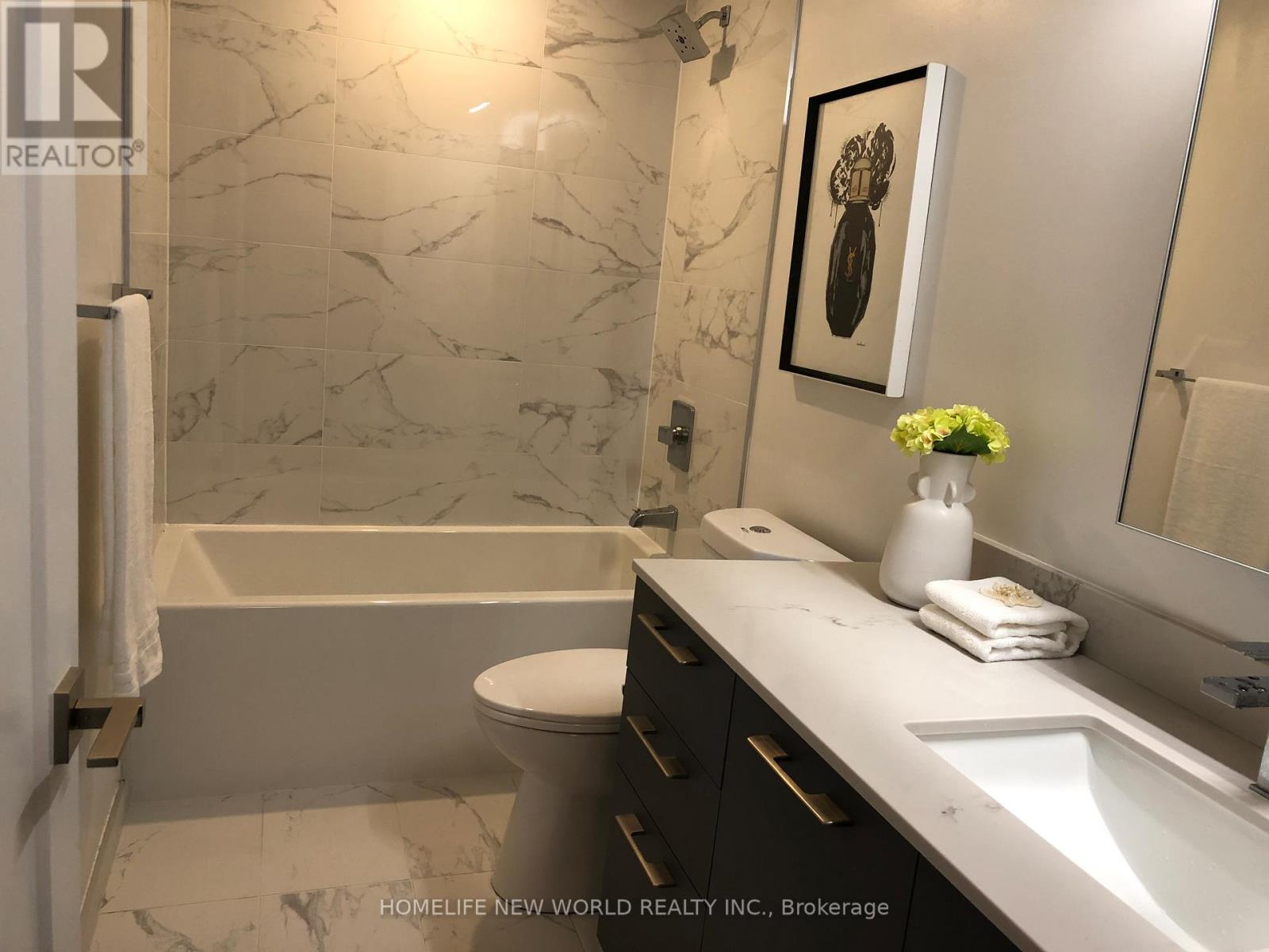 303 - 18 Water Walk Drive, Markham, Ontario  L3R 6L5 - Photo 10 - N12380024