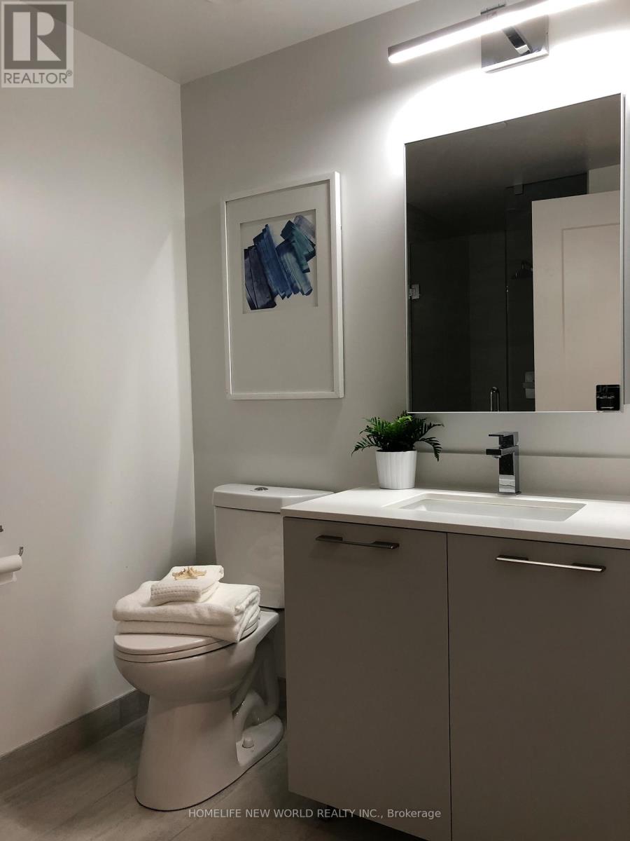 303 - 18 Water Walk Drive, Markham, Ontario  L3R 6L5 - Photo 11 - N12380024