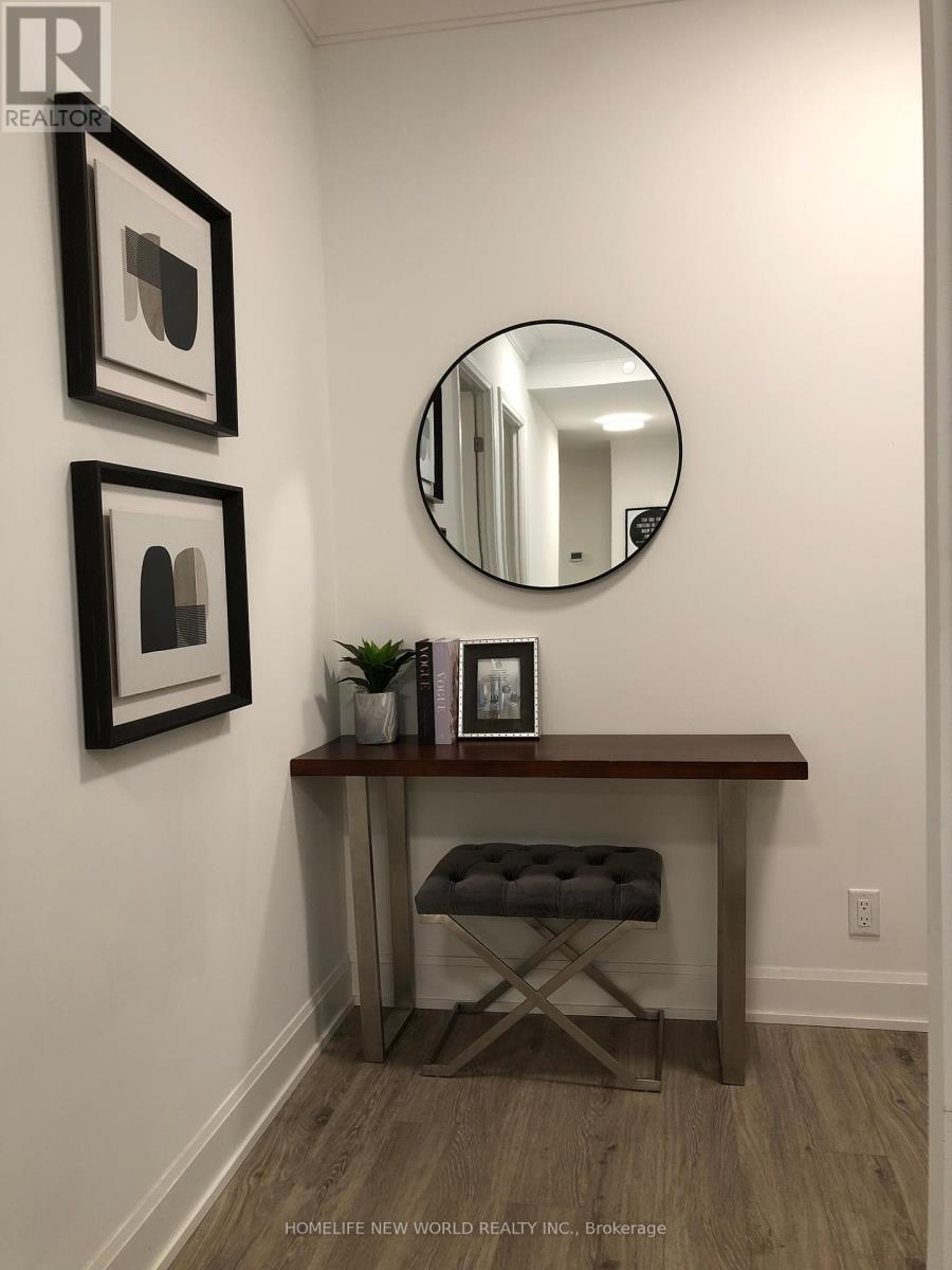 303 - 18 Water Walk Drive, Markham, Ontario  L3R 6L5 - Photo 3 - N12380024