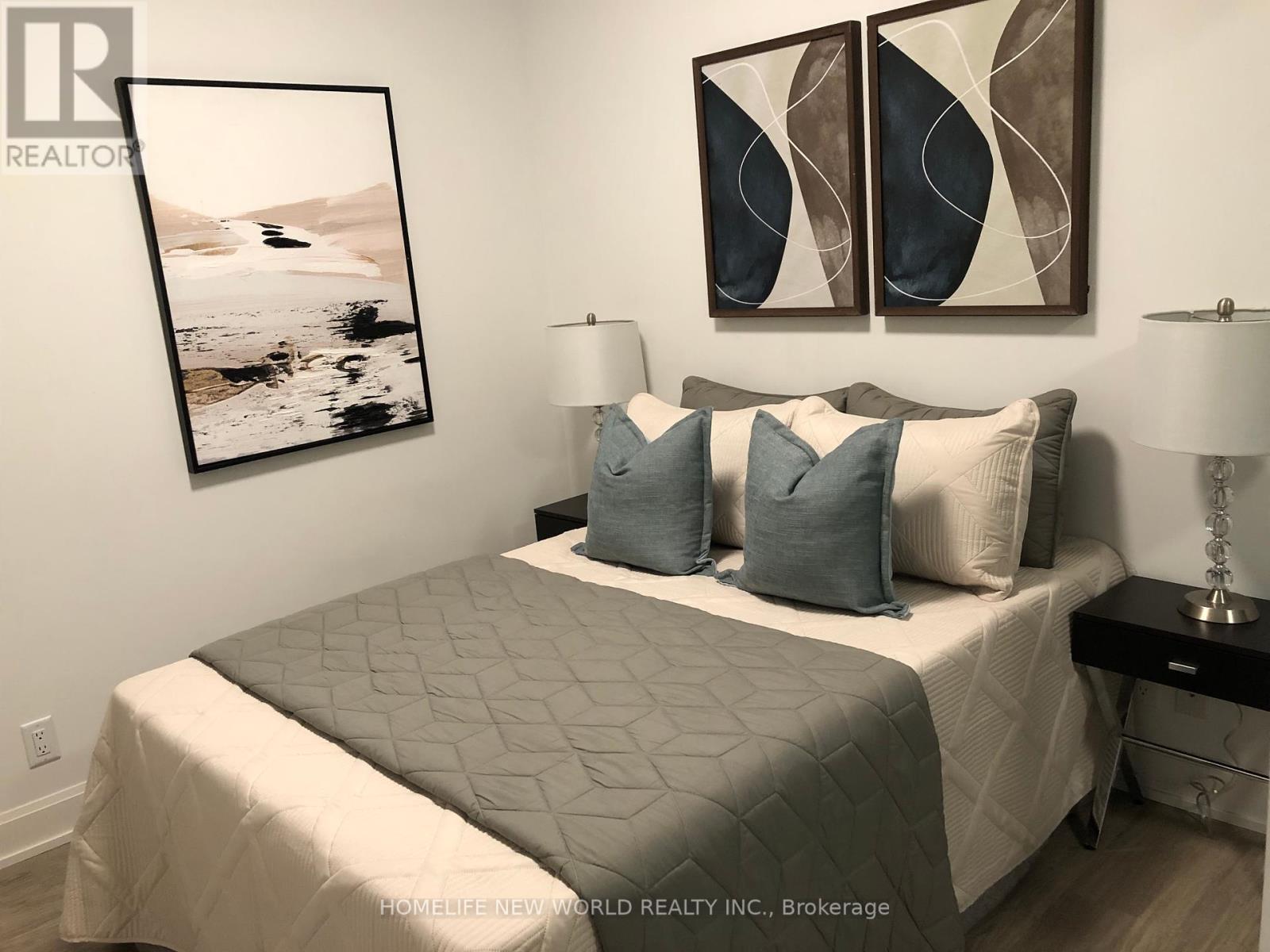 303 - 18 Water Walk Drive, Markham, Ontario  L3R 6L5 - Photo 4 - N12380024